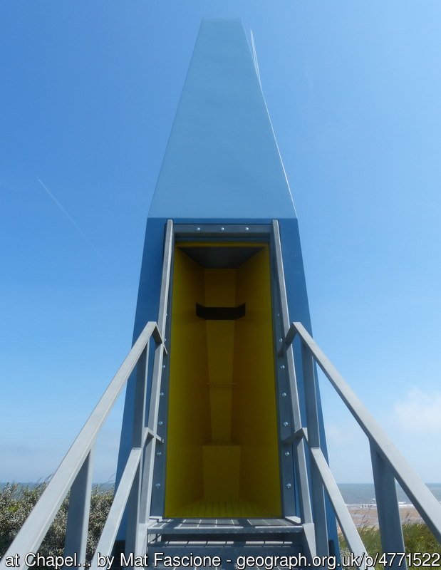 The Sound Tower at Chapel Six Marshes Part of the Structures on the Edge Project, the tower was erected in Spring 2014. Viewers approach the tower to find an internal yellow vessel with no view. As users enter, the whole interior chamber lowers to engage a controlled view of the horizon. This is accompanied by a resonant sound created by a striking ‘gong’ that announces the towers use to people on the beach. Furthermore the lowering chamber engages a wind channel that allows the whole tower to act as a wind funnel that amplifies the natural conditions of the site.