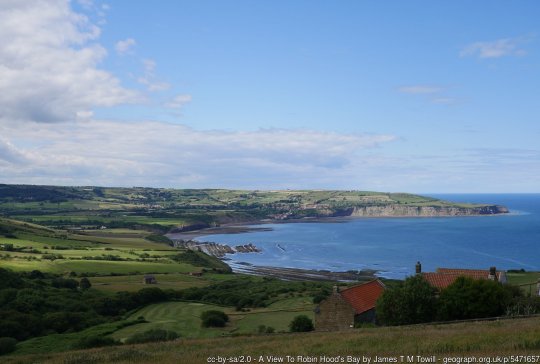 A View To Robin Hood’s Bay Robin Hood’s Bay illuminated by the July sunshine, as viewed from Ravenscar (under a passing cloud!)